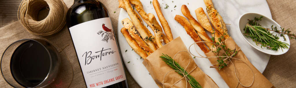 Bonterra Cabernet Sauvignon next to bundles of rustic breadsticks