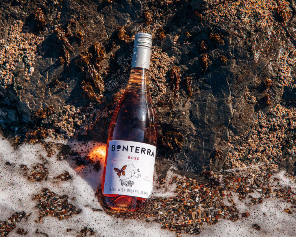 bottle of bonterra rose on the beach